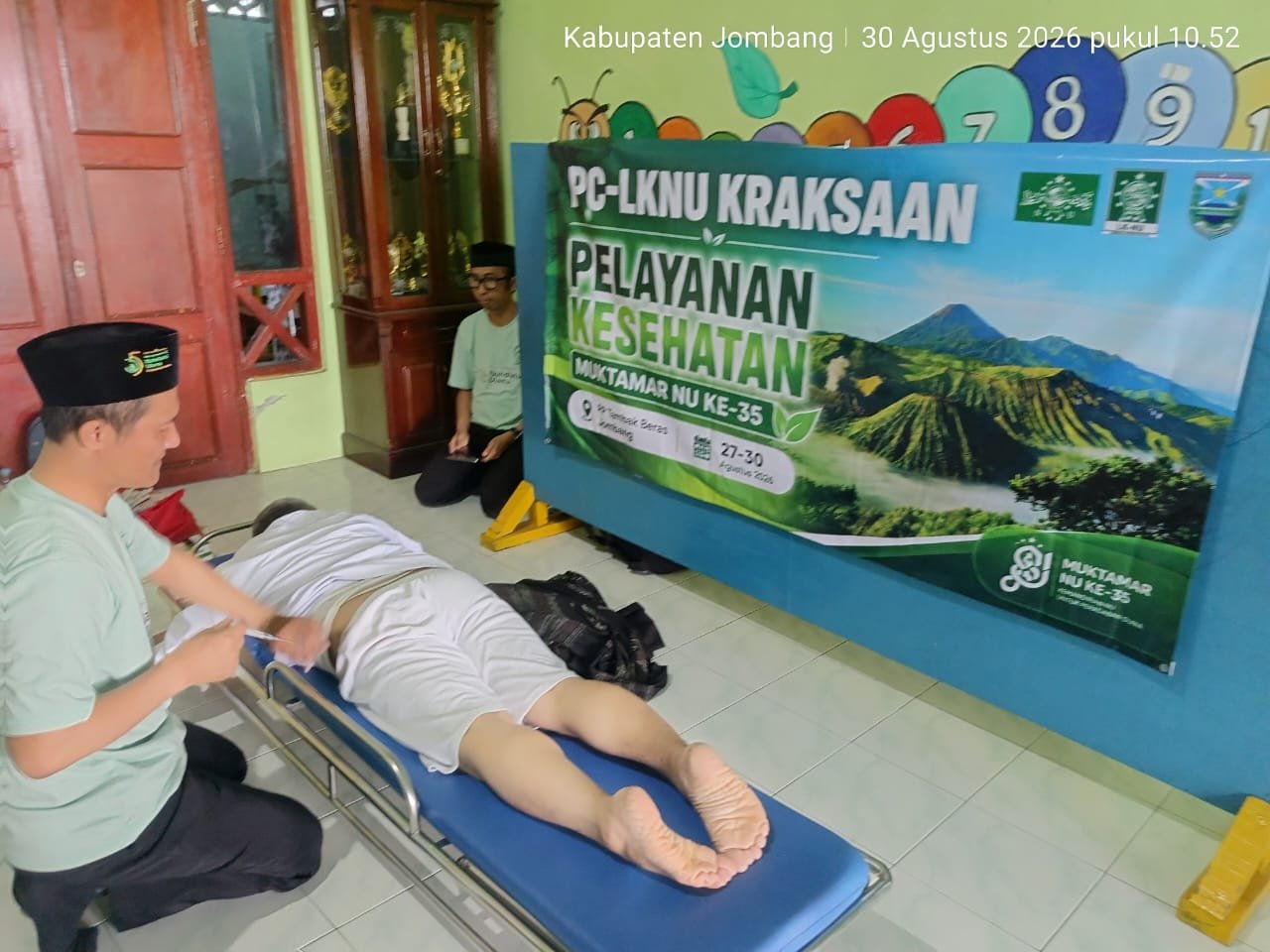 Kawal Kesehatan Muktamirin, Kepala UPT Puskesmas Krejengan Turut Siaga di Muktamar ke-35 NU